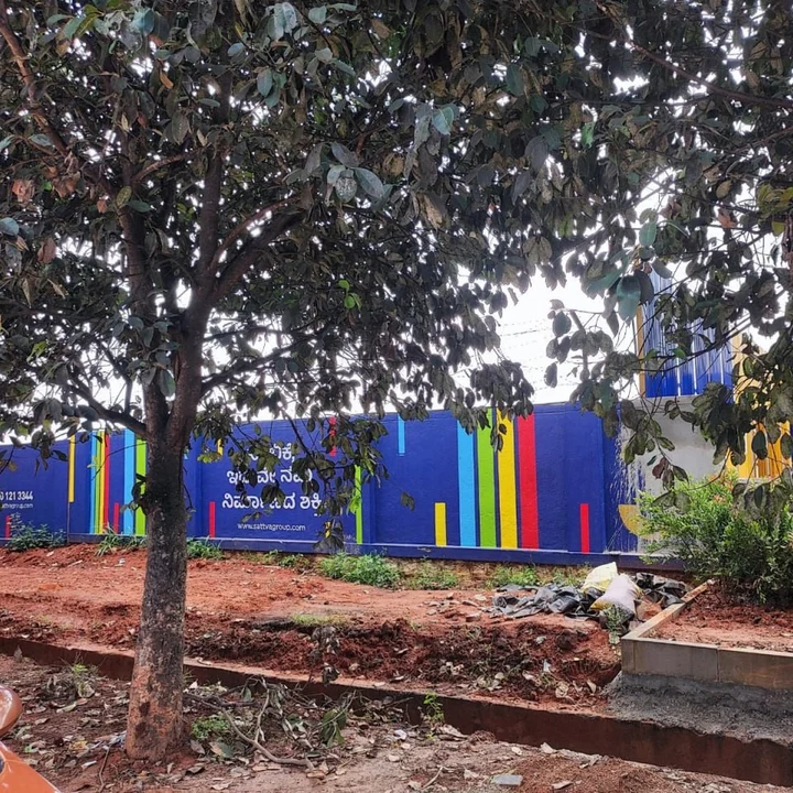Sattva-branded site hoarding at the Sattva KIADB boundary, Bagalur